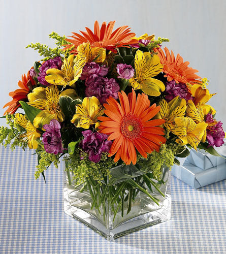 Wonderful Wishes Bouquet - colourful flower arrangement in a clear glass cube.