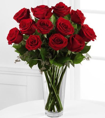 One Dozen Red Rose Arrangement - bouquet of one dozen red roses in a clear vase.