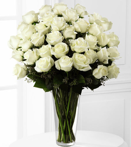 Exquisite White Rose Bouquet - three dozen white roses in a clear glass vase.