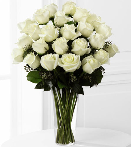 Premium White Rose Arrangement - Bouquet of two dozen white roses in a clear glass vase.