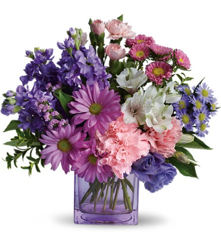 Heart's Delight by Teleflora - colourful flower bouquet with a purple glass cube.