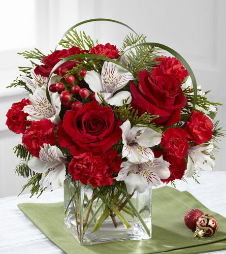 Holiday Hopes Bouquet by Better Homes and Gardens - arrangement of red roses and white flowers in a clear vase. 