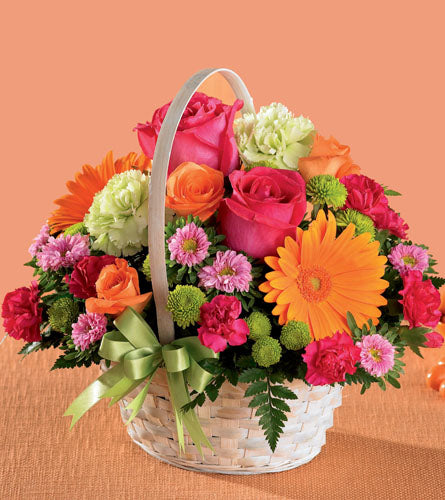 Summer in the Park Basket - colourful bright flower arrangement in a woven handled basket.