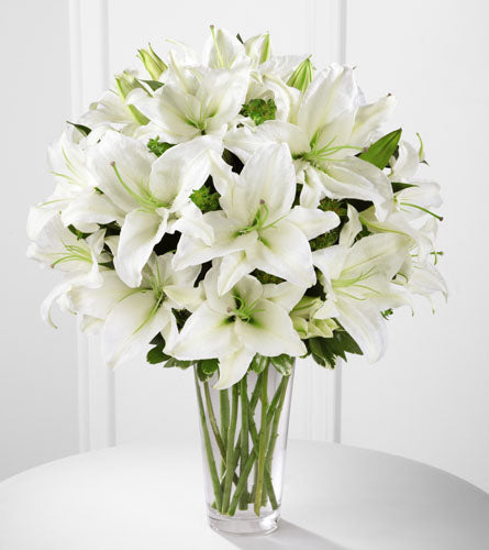 Spirited Grace Lily Bouquet - arrangement of white lilies in a clear glass vase.