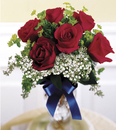 FTD's Unity Bouquet - arrangement of red roses with greenery and a blue ribbon in a glass vase.