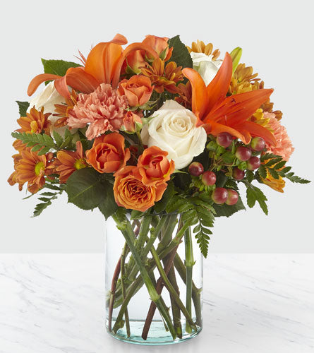 Falling for Autumn - bouquet of flowers in a clear vase.