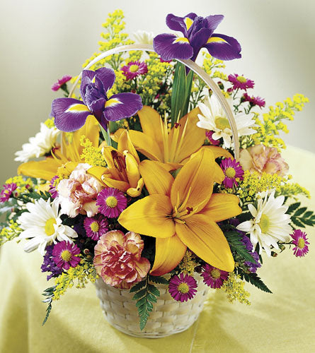 Natural Wonders Basket - colourful flower arrangement in a basket.