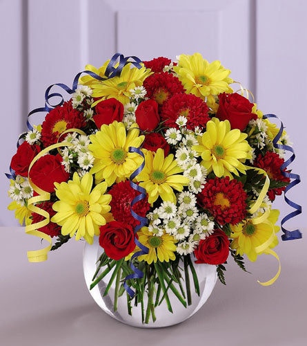 All for You Bouquet - arrangement of red, yellow, and white flowers in a white vase.