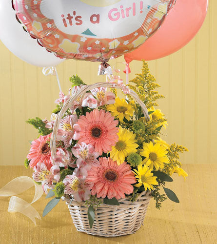 Girls Are Great! Bouquet - floral arrangement in a basket with balloons declaring 'it's a girl!'.