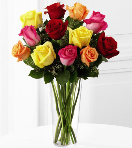 Bright Spark Rose Bouquet - arrangement of a dozen colourful mixed roses in a clear vase.