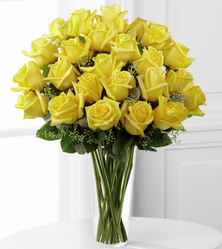 Premium Yellow Rose Arrangement - bouquet of twenty four yellow roses in a clear vase.