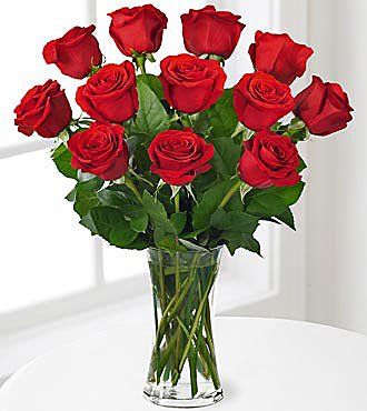 FTD's Red Rose Bouquet - floral arrangement  of red roses in a clear glass vase.