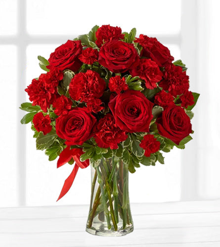 You Are My Heart Bouquet - red roses carnations and mini carnations in a clear glass vase with a red ribbon.