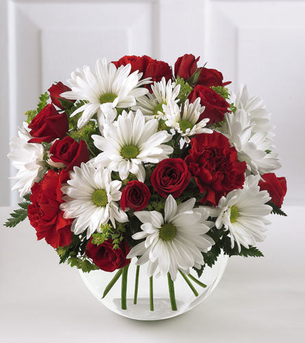 Sweet Blooms Bouquet - arrangement of red roses and white daisies in a white container.