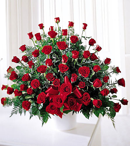 Treasured Memories Arrangement - Bouquet of red roses with greenery.