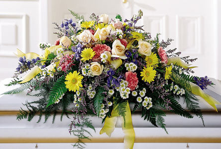 Heavenly Scented Casket Spray - colourful mixed flower floral arrangement