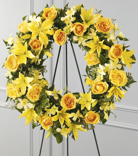 Ring of Friendship Wreath - Yellow floral wreath with roses and lilies.