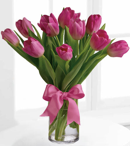 Precious Pink Tulips - bouquet of pink tulips in a clear vase with a pink bow.