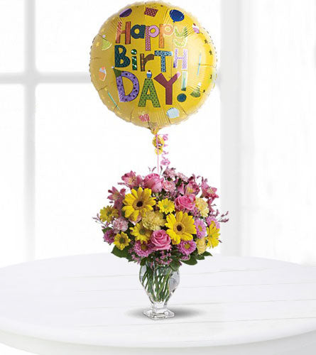 Teleflora's Dazzling Day Bouquet - colourful arrangement of flowers with a 'Happy Birthday Day!' balloon.
