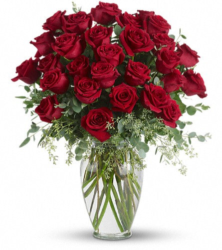 Forever Beloved - bouquet of twenty four red roses with greenery in a clear vase.