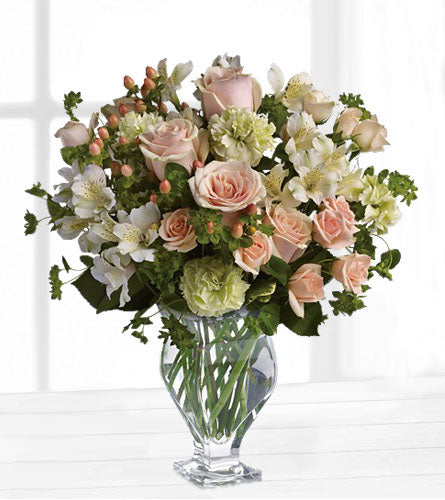 Anything for You - bouquet of mixed flowers in a glass vase.