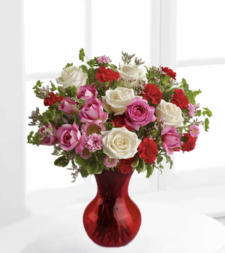 Splendid in Red - Bouquet of red, lavender and white flowers in a red vase.