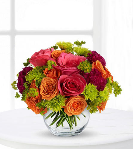 Smile for Me - Colourful bouquet of flowers in a clear, bubble bowl.