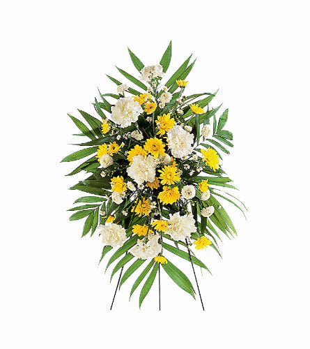 Yellow Dawn Spray - floral arrangement with yellow and white flowers on a stand.