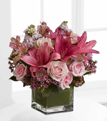 Hopeless Romantic - Square glass vase with colourful mix of pink and white flowers.