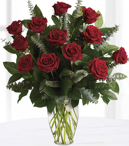 Eternal Love Bouquet -  a dozen red roses with eucalyptus n a clear glass vase.