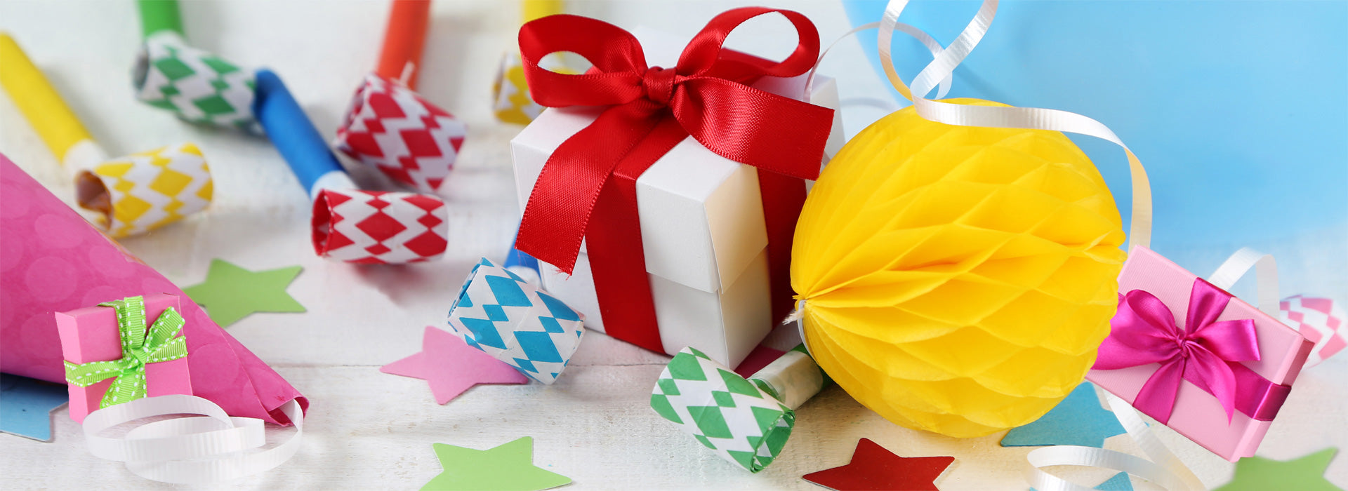 Colourful birthday presents and party decorations.